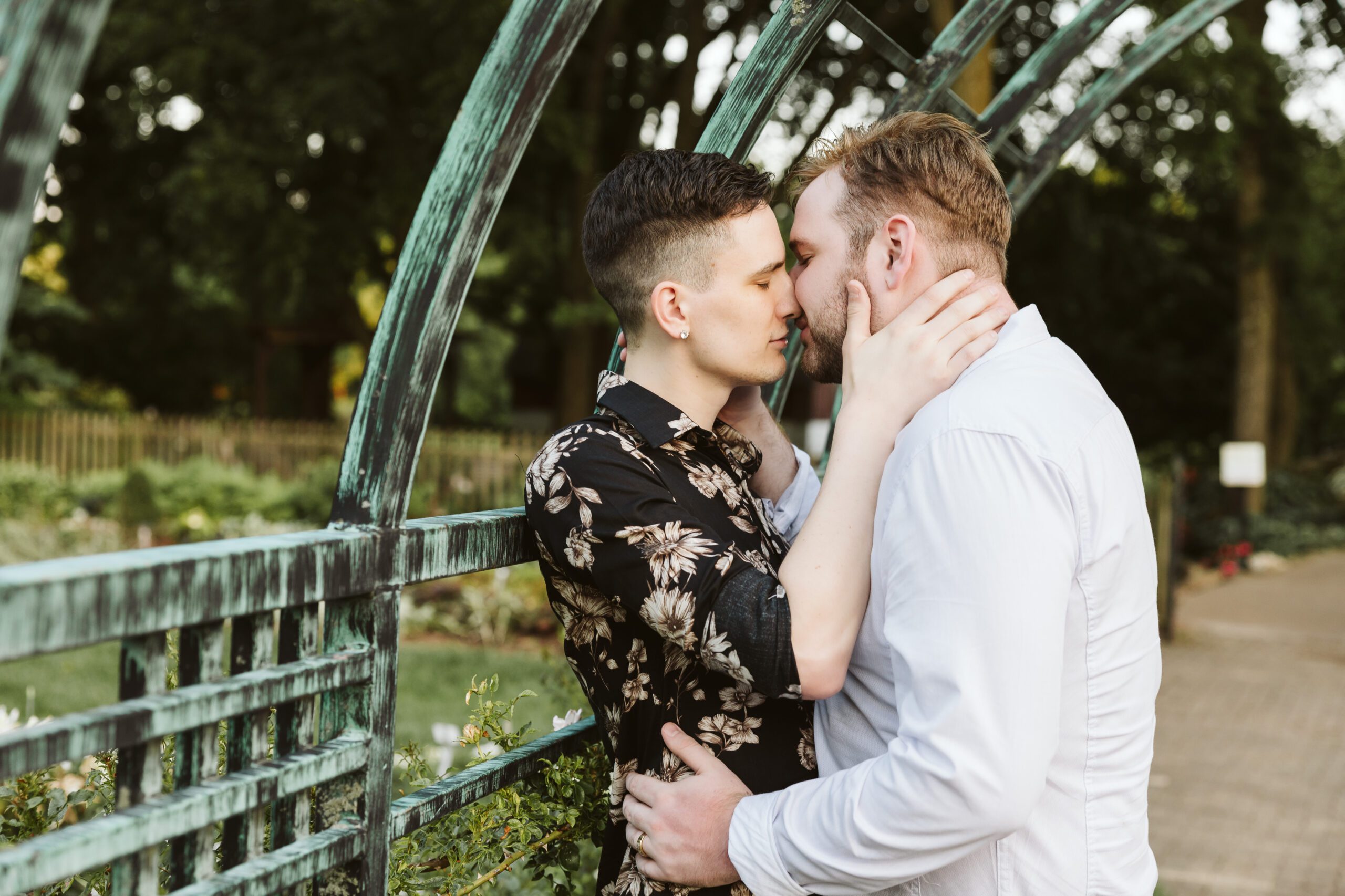 A joyful moment between John and Dustin during their Springfield, MO engagement session. Captured by Jessica Yahn Photography, showcasing love, laughter, and authentic moments.